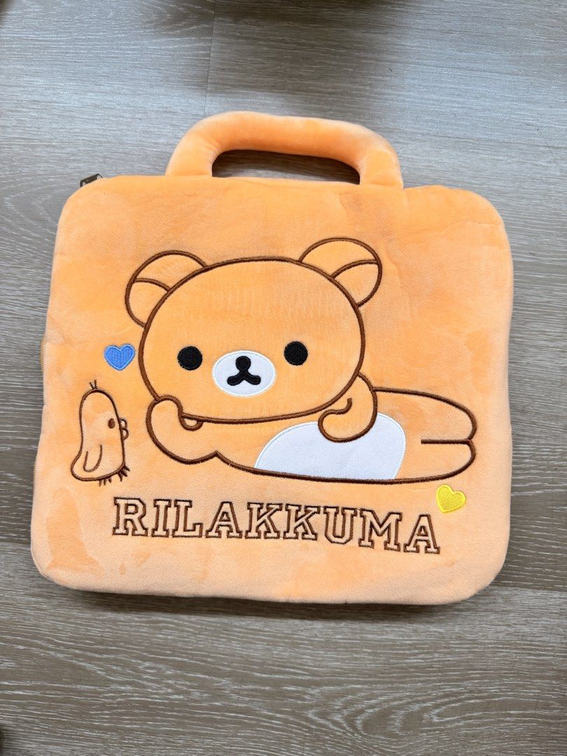 Cute Rilakkuma Orange nap blanket (Category: Plushies & Soft Toys) located in Singapore. Submitted by airpanda (Listing ID 1448788207, Image 1). Description: - Adorable orange Rilakkuma blanket - Features a convenient handle for carrying - Secure zipper closure - Made from soft, cuddly material -self collect at Yishun .