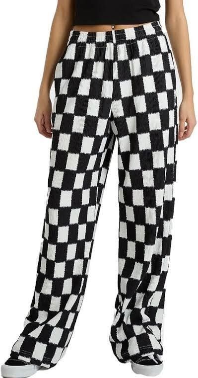 Vans Checkerboard Pleated Wide Leg Pants Unisex (more dark brown than black) (Category: Trousers) located in Singapore. Submitted by spoingus (Listing ID 1448862236, Image 2). Description: - Trendy brown and white checkerboard pattern - Stylish wide-leg silhouette - Textured pleated design - Comfortable elastic waistband - Relaxed fit for all-day comfort - Versatile for casual outings or making a fashion statement - Free Size (M-L size) DM for me