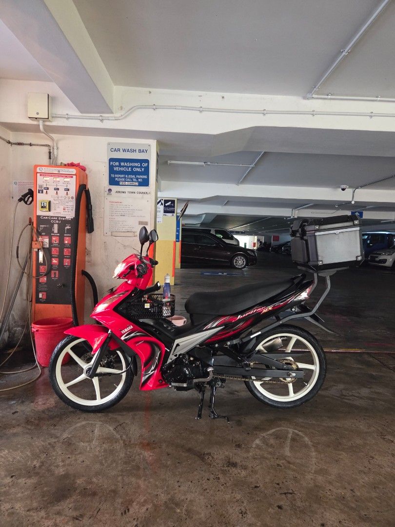YAMAHA SPARK T135 LC135 V1 (Category: Class 2B) located in Singapore. Submitted by sg_li37 (Listing ID 1449024926, Image 3). Description: Fully restored @ JB Champion Spec 57mm standard daily - Pirelli Rosso Sport F/R fresh new rubber - Enkei SP522 Cream white - Yoshimura Tri Oval with Cert Bike is paid, no COI nonsense. Full cash deal only. Source your own loan. COE Feb 2029 Renewable Slight Nego, lowballers expect to get sarcastic remarks from 