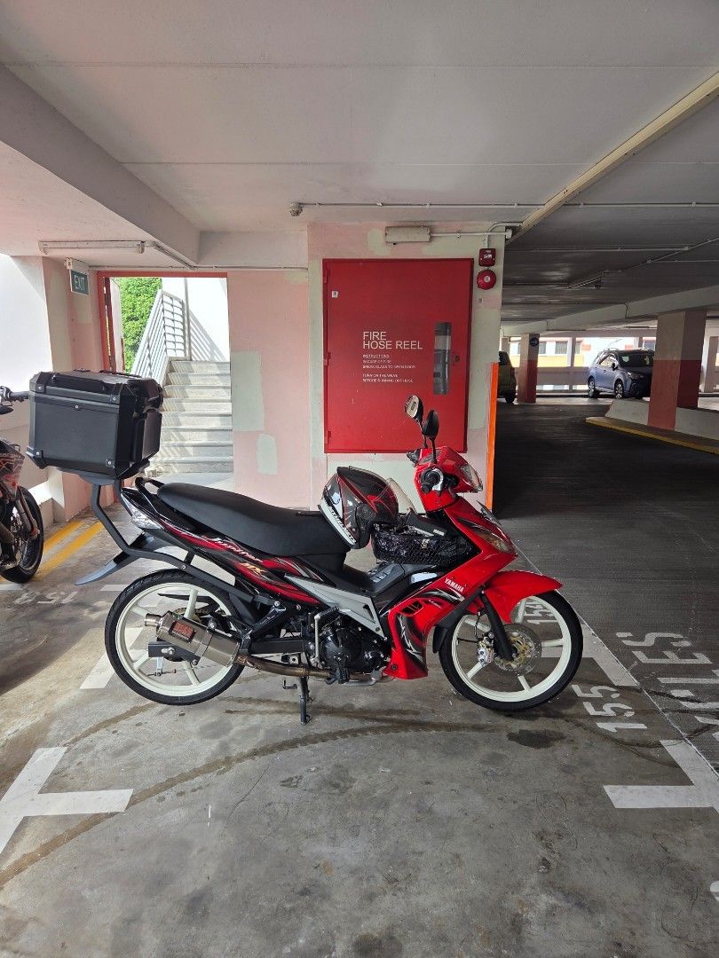 YAMAHA SPARK T135 LC135 V1 (Category: Class 2B) located in Singapore. Submitted by sg_li37 (Listing ID 1449024926, Image 4). Description: Fully restored @ JB Champion Spec 57mm standard daily - Pirelli Rosso Sport F/R fresh new rubber - Enkei SP522 Cream white - Yoshimura Tri Oval with Cert Bike is paid, no COI nonsense. Full cash deal only. Source your own loan. COE Feb 2029 Renewable Slight Nego, lowballers expect to get sarcastic remarks from 