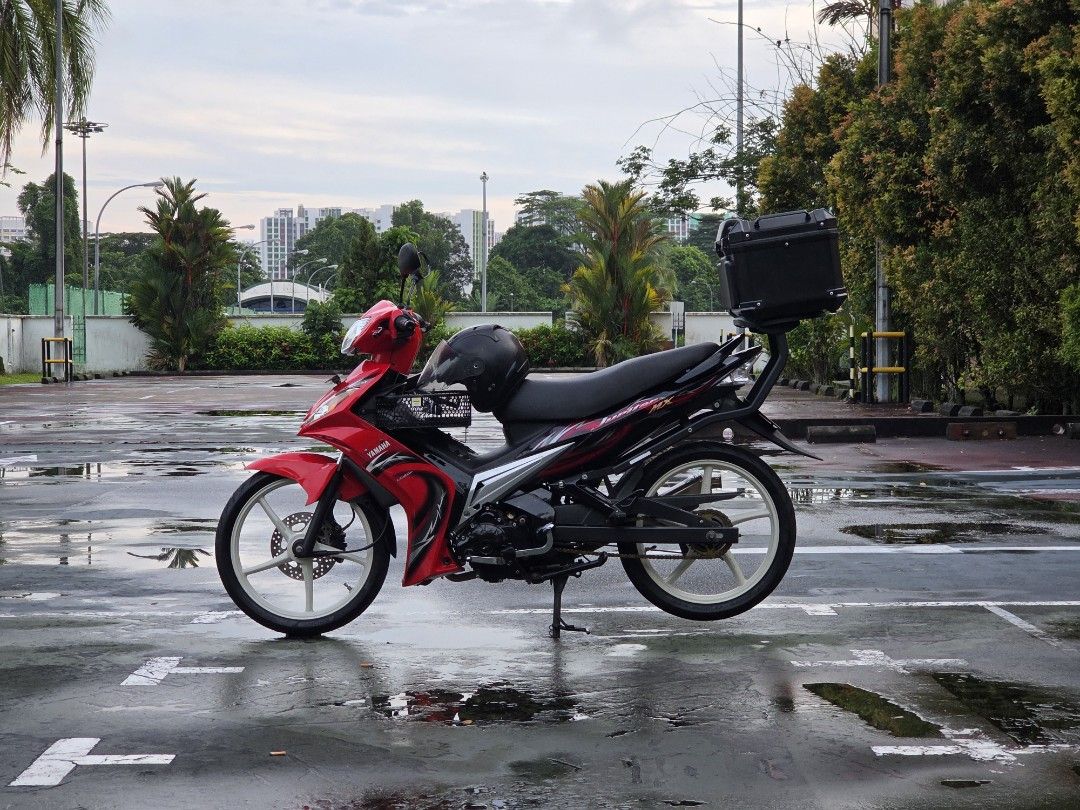 YAMAHA SPARK T135 LC135 V1 (Category: Class 2B) located in Singapore. Submitted by sg_li37 (Listing ID 1449024926, Image 1). Description: Fully restored @ JB Champion Spec 57mm standard daily - Pirelli Rosso Sport F/R fresh new rubber - Enkei SP522 Cream white - Yoshimura Tri Oval with Cert Bike is paid, no COI nonsense. Full cash deal only. Source your own loan. COE Feb 2029 Renewable Slight Nego, lowballers expect to get sarcastic remarks from 