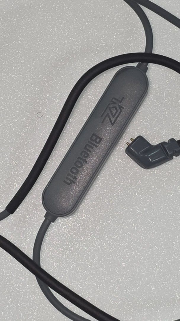 KZ APTX-HD Bluetooth 5.0 Earphone Cable (Category: Earphones) located in Singapore. Submitted by johannuar (Listing ID 1450803340, Image 2). Description: - Upgrade your earphones to wireless with this KZ Bluetooth cable. - Supports APTX-HD for high-quality audio. - Features inline controls for volume and playback. - Compatible with earphones using a 2-pin connector. (C-pin) - Comes with charging cable https://kz-audio.com/kz-bluetooth-50-cable.ht