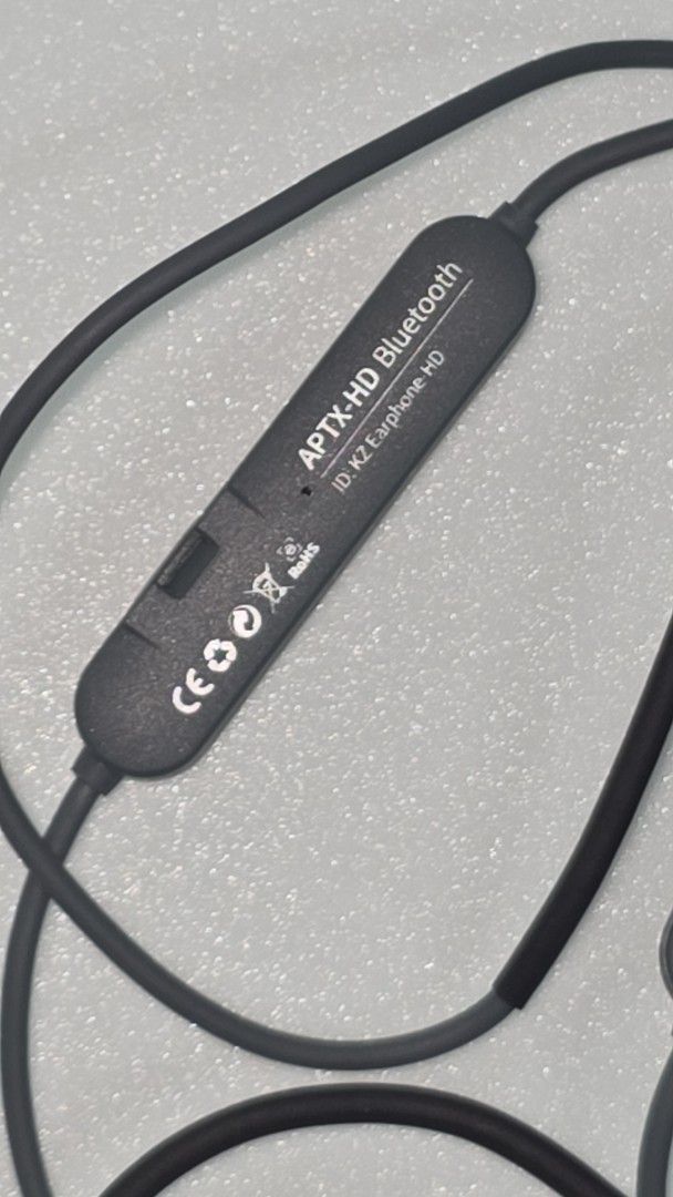 KZ APTX-HD Bluetooth 5.0 Earphone Cable (Category: Earphones) located in Singapore. Submitted by johannuar (Listing ID 1450803340, Image 3). Description: - Upgrade your earphones to wireless with this KZ Bluetooth cable. - Supports APTX-HD for high-quality audio. - Features inline controls for volume and playback. - Compatible with earphones using a 2-pin connector. (C-pin) - Comes with charging cable https://kz-audio.com/kz-bluetooth-50-cable.ht