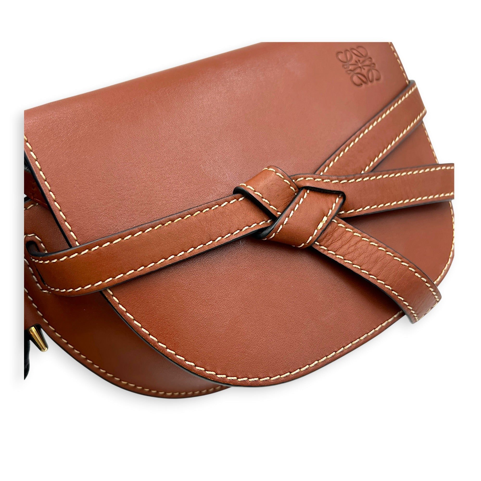 Loewe Gate Crossbody Bag Brown in Calfskin (Category: Bags & Wallets) located in Singapore. Submitted by carousellluxury (Listing ID 1451033547, Image 6). Description: SKU C2607-013365LL Material Calfskin Color Brown Strap Not Included Dimension (L)21cm × (H)12.5cm × (W)9.5cm Accessories Dust Bag, Series 522111 Circa Est 2021 Microchipped FALSE Condition - Surface: Slight scratches - Bottom Edge / Base / Bagfeet: Small scuff - Handle / Strap: In 