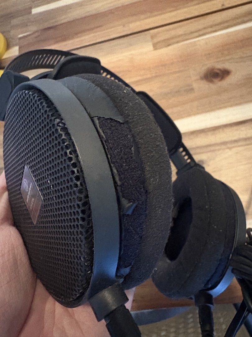 Audio-Technica ATH-R70x Open-Back Professional Headphones (Category: Headphones & Headsets) located in Singapore. Submitted by eisnomore (Listing ID 1452007408, Image 2). Description: - tears on the cushion cups, might need replacing. - otherwise, drivers and other compknents in good working condition - price negotiable.
