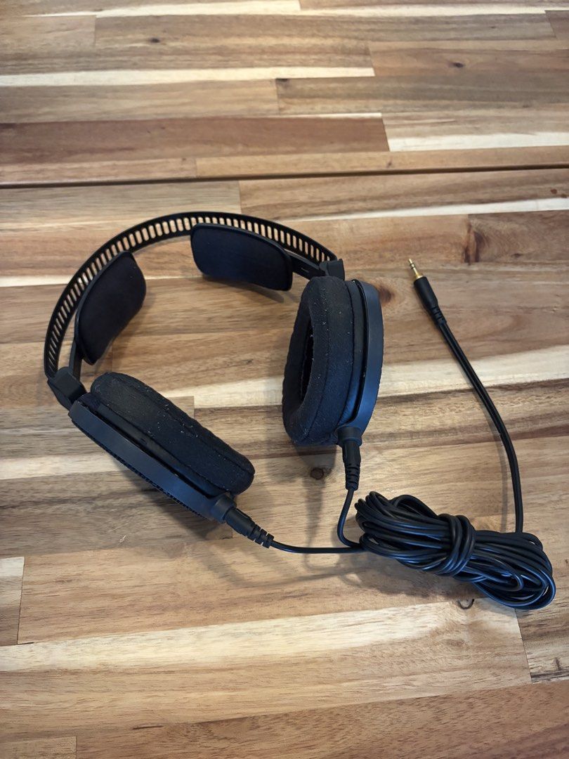 Audio-Technica ATH-R70x Open-Back Professional Headphones (Category: Headphones & Headsets) located in Singapore. Submitted by eisnomore (Listing ID 1452007408, Image 1). Description: - tears on the cushion cups, might need replacing. - otherwise, drivers and other compknents in good working condition - price negotiable.