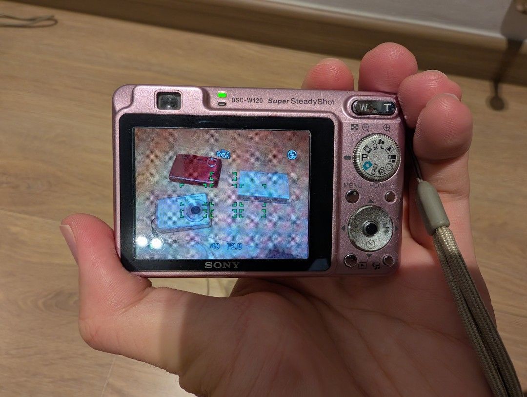Y2K Digital Cameras (Category: Cameras) located in Singapore. Submitted by solidgood (Listing ID 1452290196, Image 3). Description: Sony W120 Pink - $80 (Pic 2) 😅 Flash is not working ✅ Zoom works ✅ Comes with battery and charger ✅ Screen is clear and clean Fujifilm Finepix F460 - $100 (Pic 4) ✅ Screen is clear and clean ✅ Flash and zoom works ✅ Comes with battery, charger and memory card 😅 Sometimes there is lines on the picture (but once you 