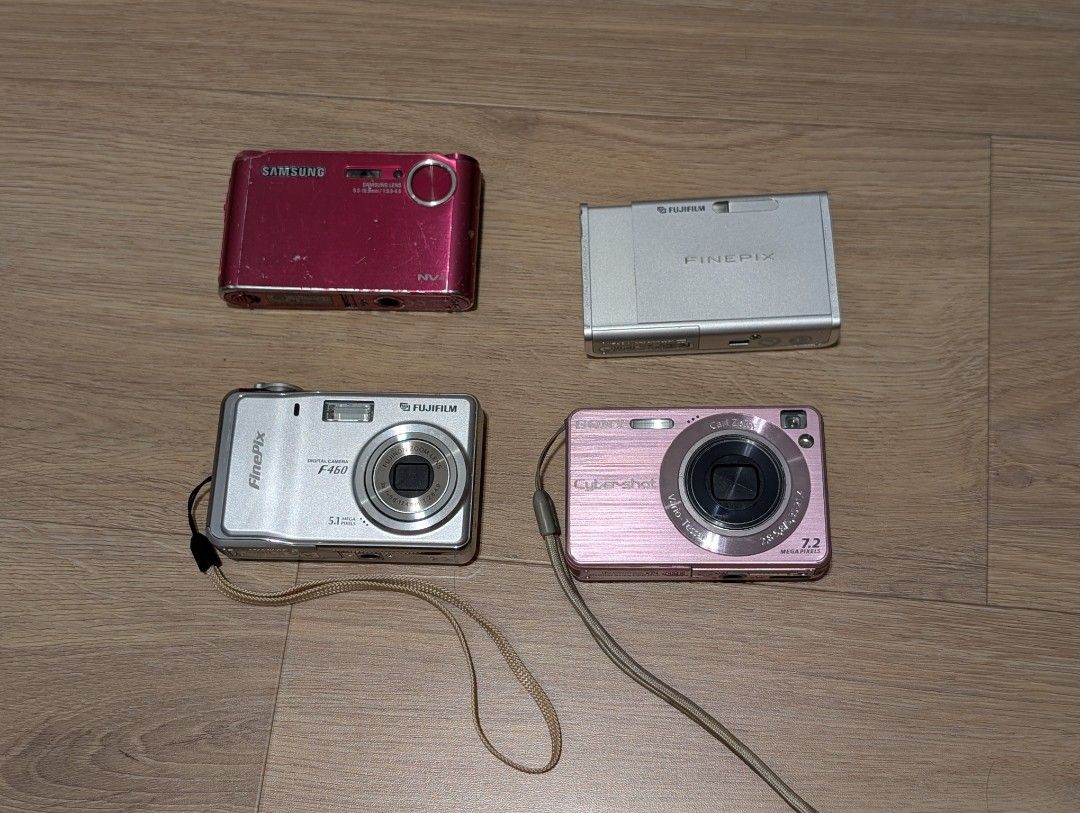 Y2K Digital Cameras (Category: Cameras) located in Singapore. Submitted by solidgood (Listing ID 1452290196, Image 1). Description: Sony W120 Pink - $80 (Pic 2) 😅 Flash is not working ✅ Zoom works ✅ Comes with battery and charger ✅ Screen is clear and clean Fujifilm Finepix F460 - $100 (Pic 4) ✅ Screen is clear and clean ✅ Flash and zoom works ✅ Comes with battery, charger and memory card 😅 Sometimes there is lines on the picture (but once you 