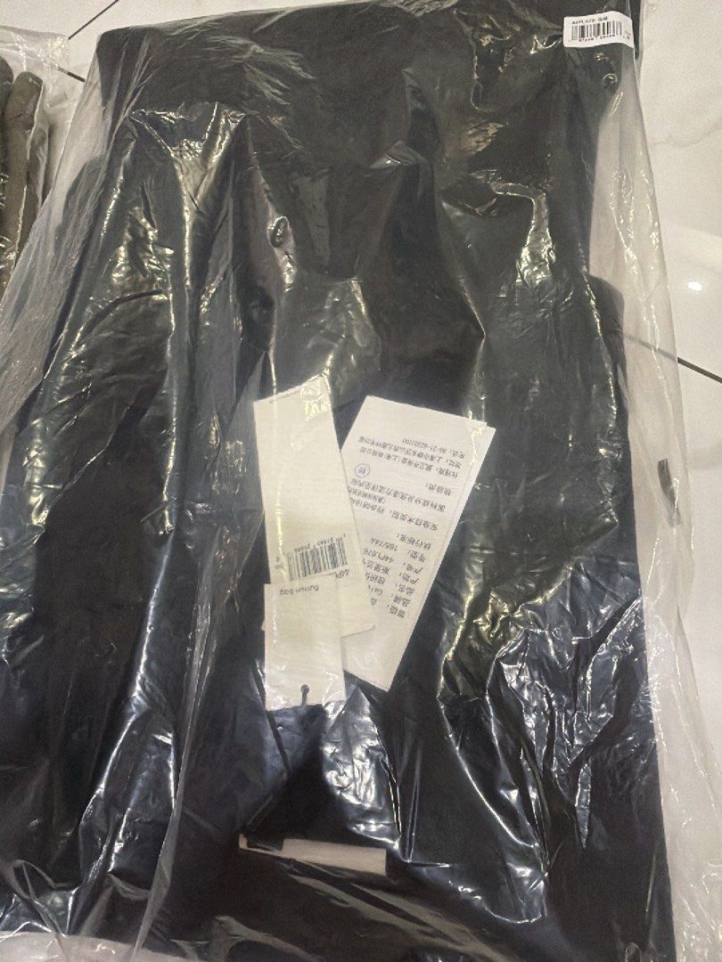 Calvin Klein Black Wide Leg Trousers (Category: Jeans & Leggings) located in Singapore. Submitted by btc2020 (Listing ID 1453220414, Image 6). Description: - Brand: Calvin Klein - Color: Black - Style: Wide leg trousers - Waist: High waisted - Fit: Relaxed - Pockets: Two front, one back - Features: Classic tailoring - Occasion: Suitable for work or casual wear - Versatility: A versatile wardrobe staple Brand new with tags..