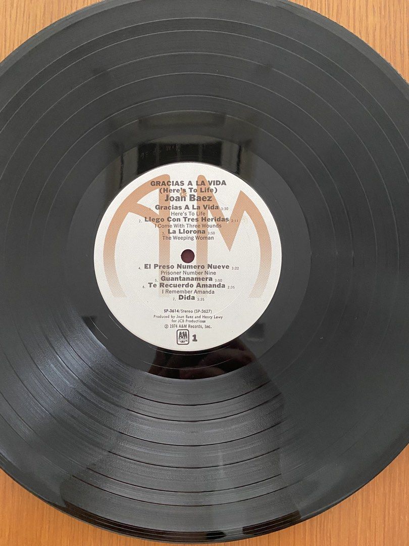 Vinyl / LP: folk - John Baez Gracias à la Vida (Here’s to life), Canadian A&M Press (Category: Vinyls) located in Singapore. Submitted by dlkchang (Listing ID 1455023195, Image 6). Description: In excellent condition. Cover is graded as Near Mint, still in shrink. Vinyl is visually and playgraded as Near Mint. Vinyl has been cleaned. .