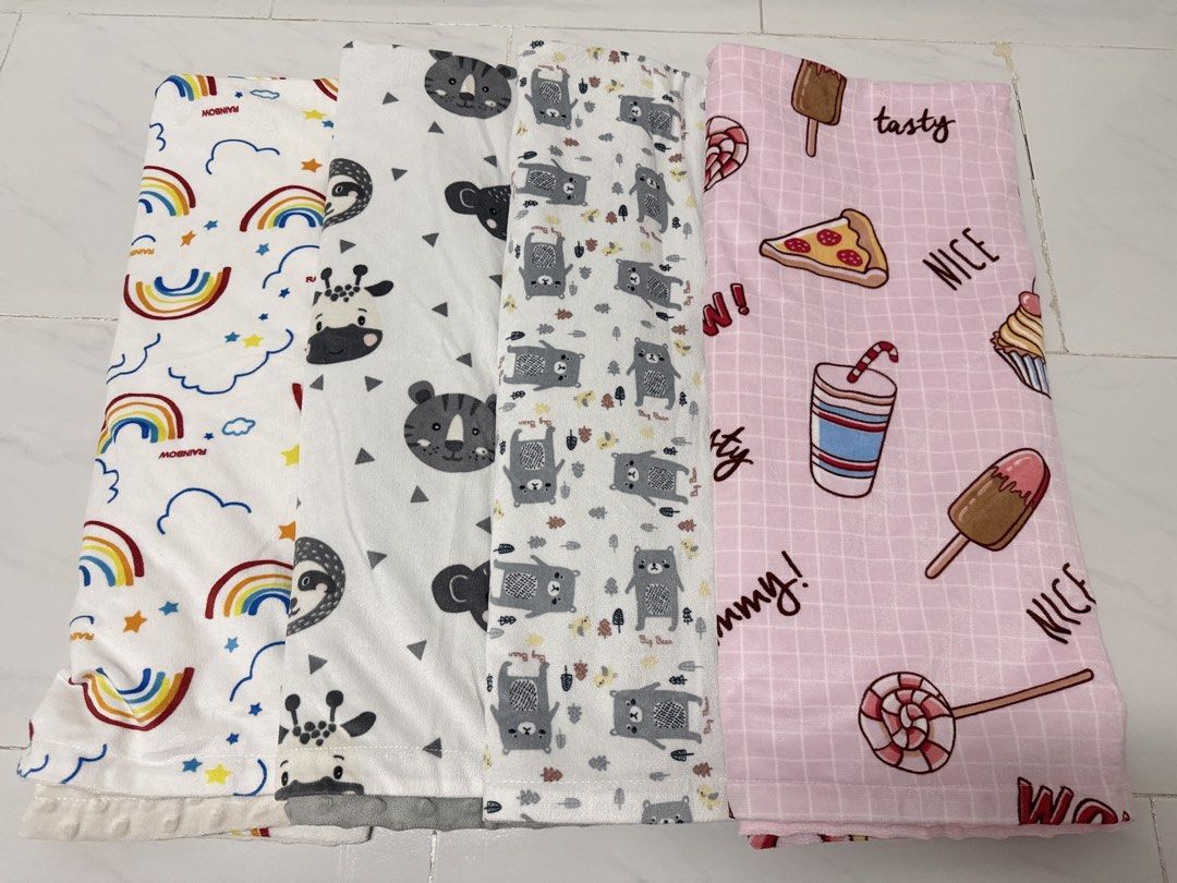 Super Soft Baby Kids Blanket Plush Minky Dot backing / Toddler Childcare Center Aircon Blanket (Category: Childrens' Beds) located in Singapore. Submitted by dj.qnoi (Listing ID 1455622915, Image 1). Description: Baby Blanket - Super soft plush minky dot blankets - Perfect for babies and toddlers - Ideal for nap time, strollers, and air-conditioned rooms Adorable designs: 1) rainbows 2) animals 3) grey bear 4) food prints - Minky dot backing for 