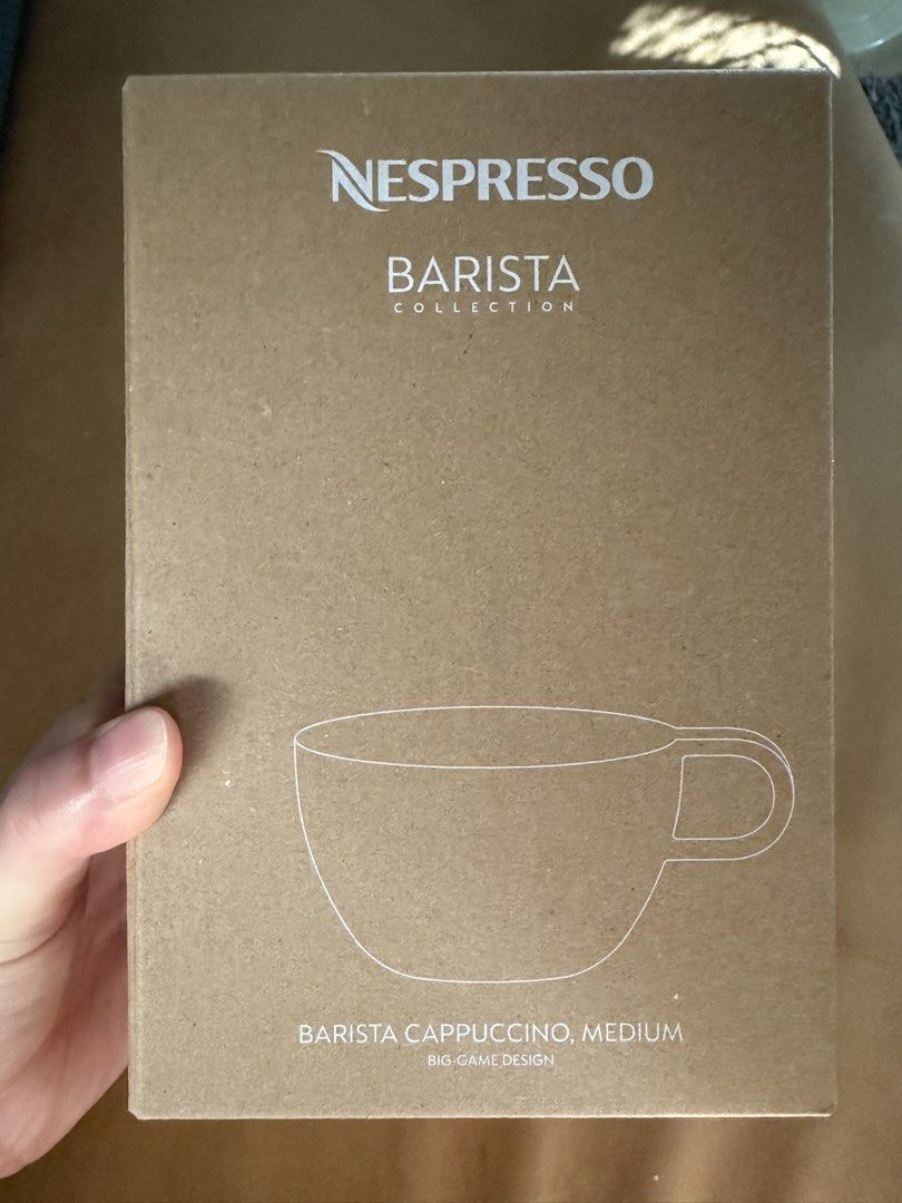 BNIB Nespresso Barista Cappuccino medium cups set of 2 (Category: Coffee & Tea Tableware) located in Singapore. Submitted by strawberryapplepie (Listing ID 1455949349, Image 2). Description: Brand new in box Nespresso Barista collection Barista cappuccino cups, medium 2 in a set Dimensions: height 6.1 cm, Ø 9.7 cm, overflow capacity ca. 270 ml Material: porcelain Dishwasher safe.