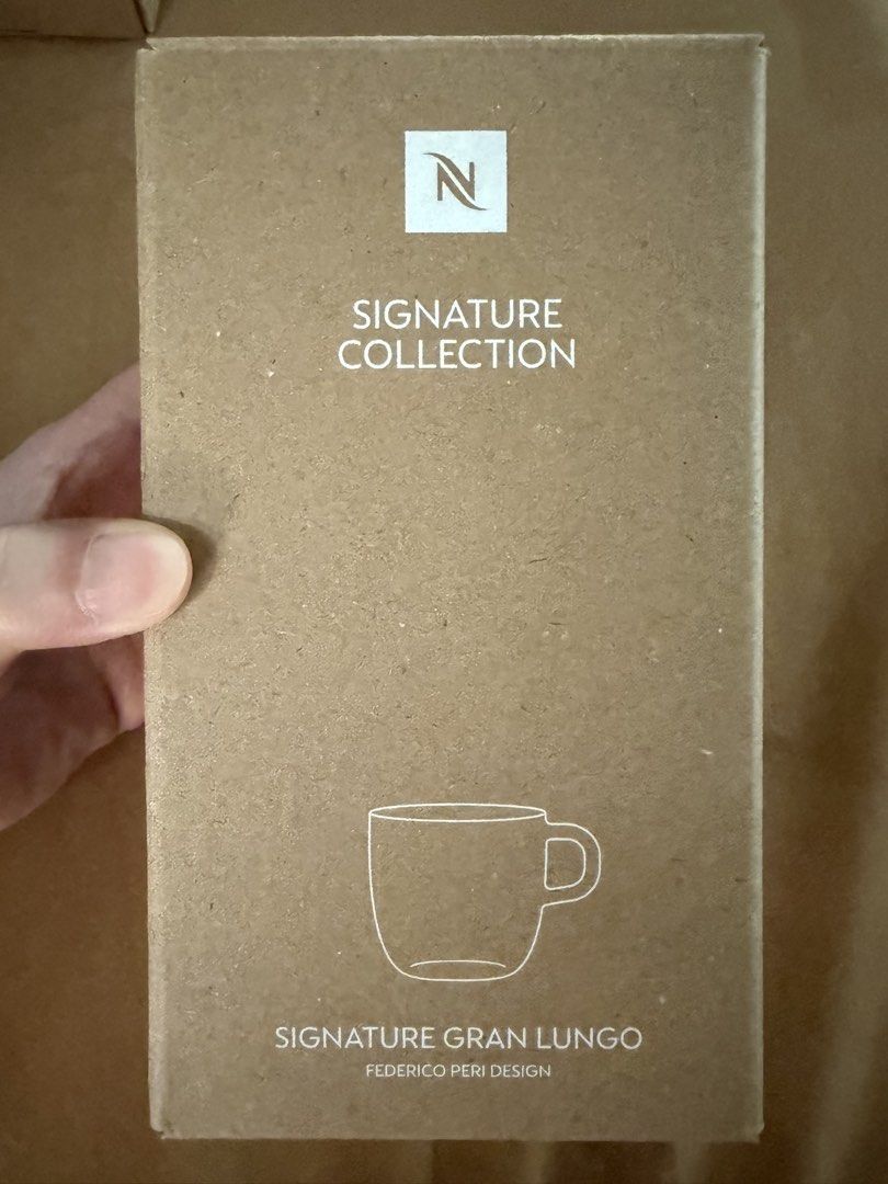 BNIB Nespresso Signature Gran Lungo cups set of 2 (Category: Coffee & Tea Tableware) located in Singapore. Submitted by strawberryapplepie (Listing ID 1455949994, Image 2). Description: Brand new in box Nespresso Signature collection Signature Gran Lungo cups x 2 in a set Capacity: 270 ml​ Dimension (Height, Diameter): 7.9 cm, 8.3 cm Material: Tempered glass Dishwasher safe RTP $48 sgd .