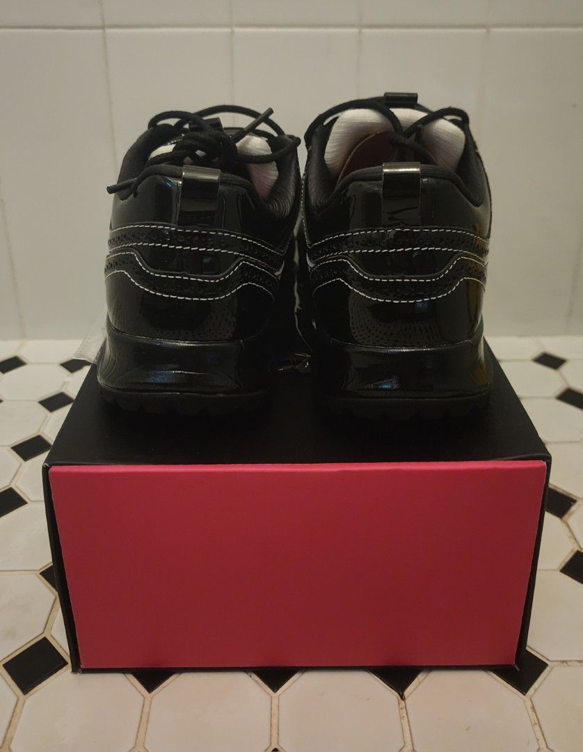 STAPLE x Sbtg x Kanky (Category: Sneakers) located in Singapore. Submitted by jemwong (Listing ID 1456141394, Image 4). Description: - Brand: STAPLE x SBTG x Kanky - Size: EU 42 (Men's Footwear) - Color: Black and White - Design: Classic silhouette with a mix of patent finishes, detailed stitching, and perforated accents. - Condition: BNIB - Features: Unique collaboration piece. - Meetup Location: Skyparc@Dawson (Blk 96 Dawson Road, 141096) Viewi