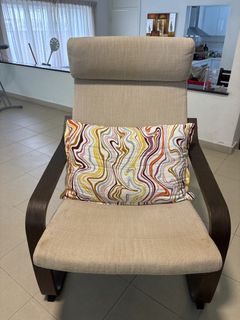 Comfortable Fabric Armchair with Wooden Frame and Decorative Pillow