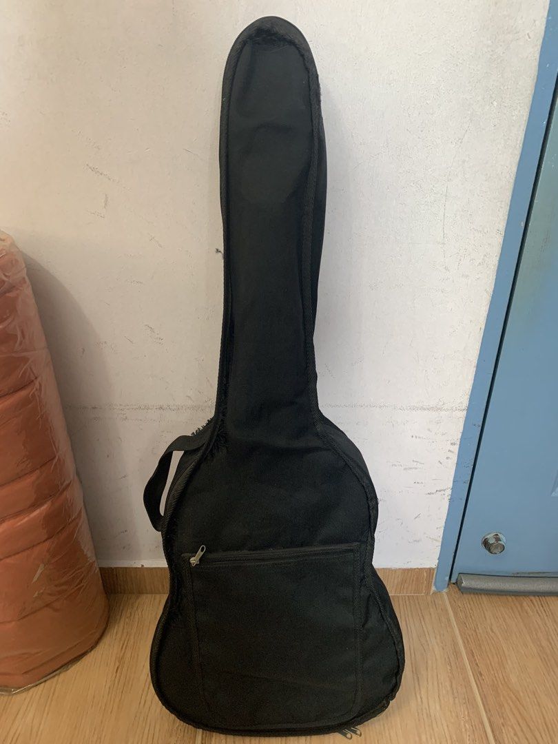 Congress Classical Guitar with Bag (Category: Musical Instruments) located in Singapore. Submitted by ukiyoscript (Listing ID 1456628846, Image 4). Description: - Congress classical guitar - Natural wood finish - Nylon strings - Includes black guitar bag (note: some tears) - Ideal for beginners or casual playing - Pickup only - Open to nego.