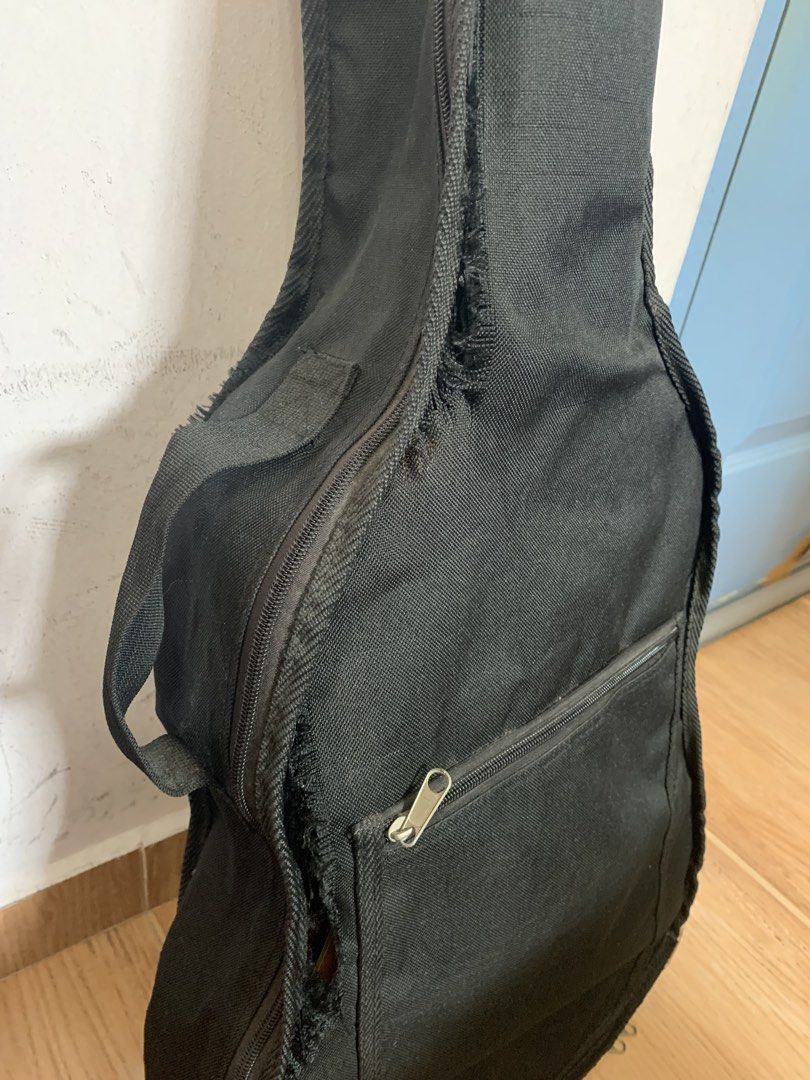 Congress Classical Guitar with Bag (Category: Musical Instruments) located in Singapore. Submitted by ukiyoscript (Listing ID 1456628846, Image 6). Description: - Congress classical guitar - Natural wood finish - Nylon strings - Includes black guitar bag (note: some tears) - Ideal for beginners or casual playing - Pickup only - Open to nego.