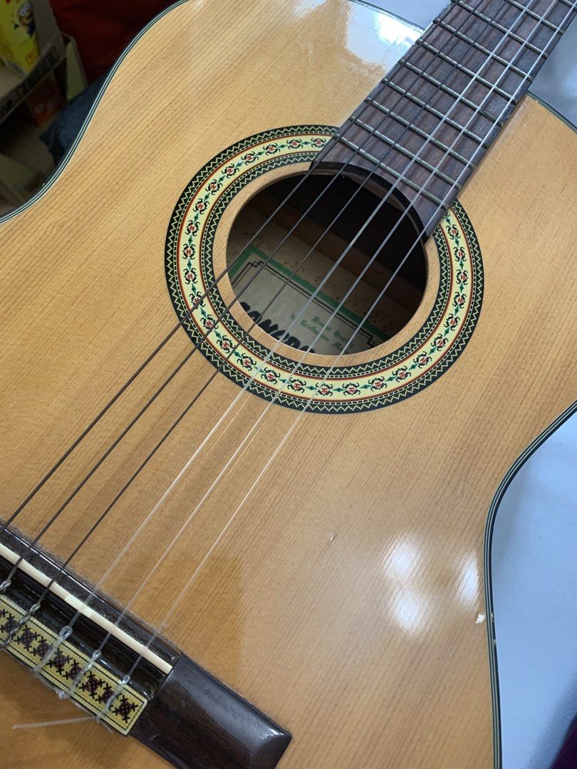 Congress Classical Guitar with Bag (Category: Musical Instruments) located in Singapore. Submitted by ukiyoscript (Listing ID 1456628846, Image 3). Description: - Congress classical guitar - Natural wood finish - Nylon strings - Includes black guitar bag (note: some tears) - Ideal for beginners or casual playing - Pickup only - Open to nego.