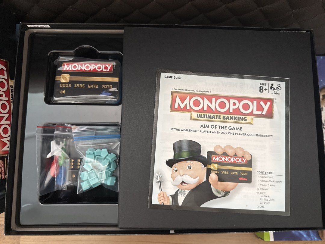 [Assorted Board Games] Monopoly, Blokus, Chess, and more! (Category: Board Games & Puzzles) located in Singapore. Submitted by lynniestuff (Listing ID 1456814050, Image 2). Description: **Price List** Junior Blokus - $5 Monopoly Ultimate Banking - $20 [SOLD] Kopi King - $18 Cards Against Humanity - $15 Disturbed Friends - $15 Chinese Chess - $5 Chinese Chess (Wood) - $20 Chess Game - $5 The Game of Life - $10 .
