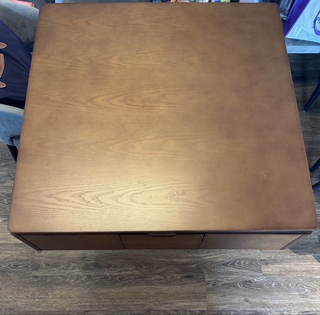 Dining table with Mahjong Table (Category: Tables & Sets) located in Singapore. Submitted by mypunnybunny (Listing ID 1456852550, Image 2). Description: Bought the table at $2.2k, selling at $1.5k - It’s dining table with mahjong table - Comes with 2 sets of tiles - 90cm by 90cm by 82cm height .