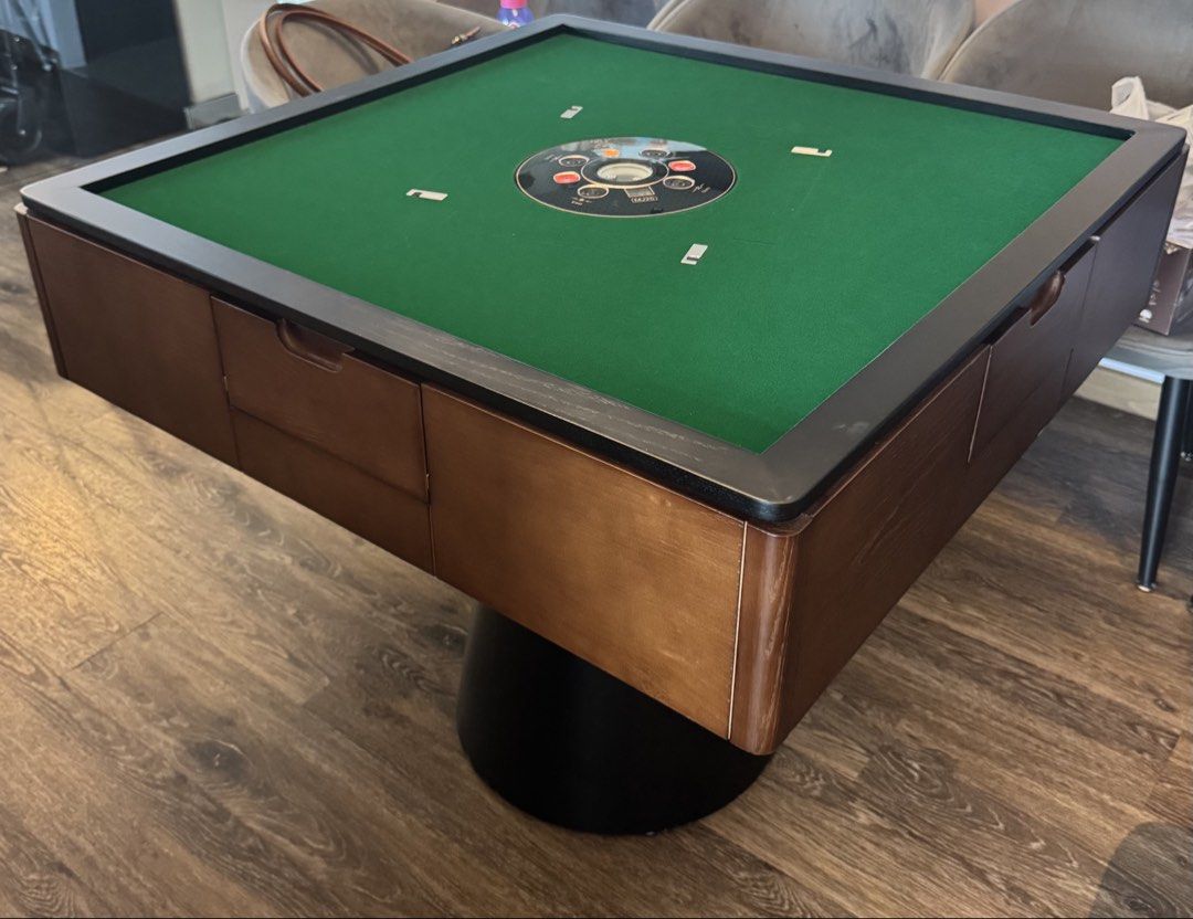 Dining table with Mahjong Table (Category: Tables & Sets) located in Singapore. Submitted by mypunnybunny (Listing ID 1456852550, Image 5). Description: Bought the table at $2.2k, selling at $1.5k - It’s dining table with mahjong table - Comes with 2 sets of tiles - 90cm by 90cm by 82cm height .