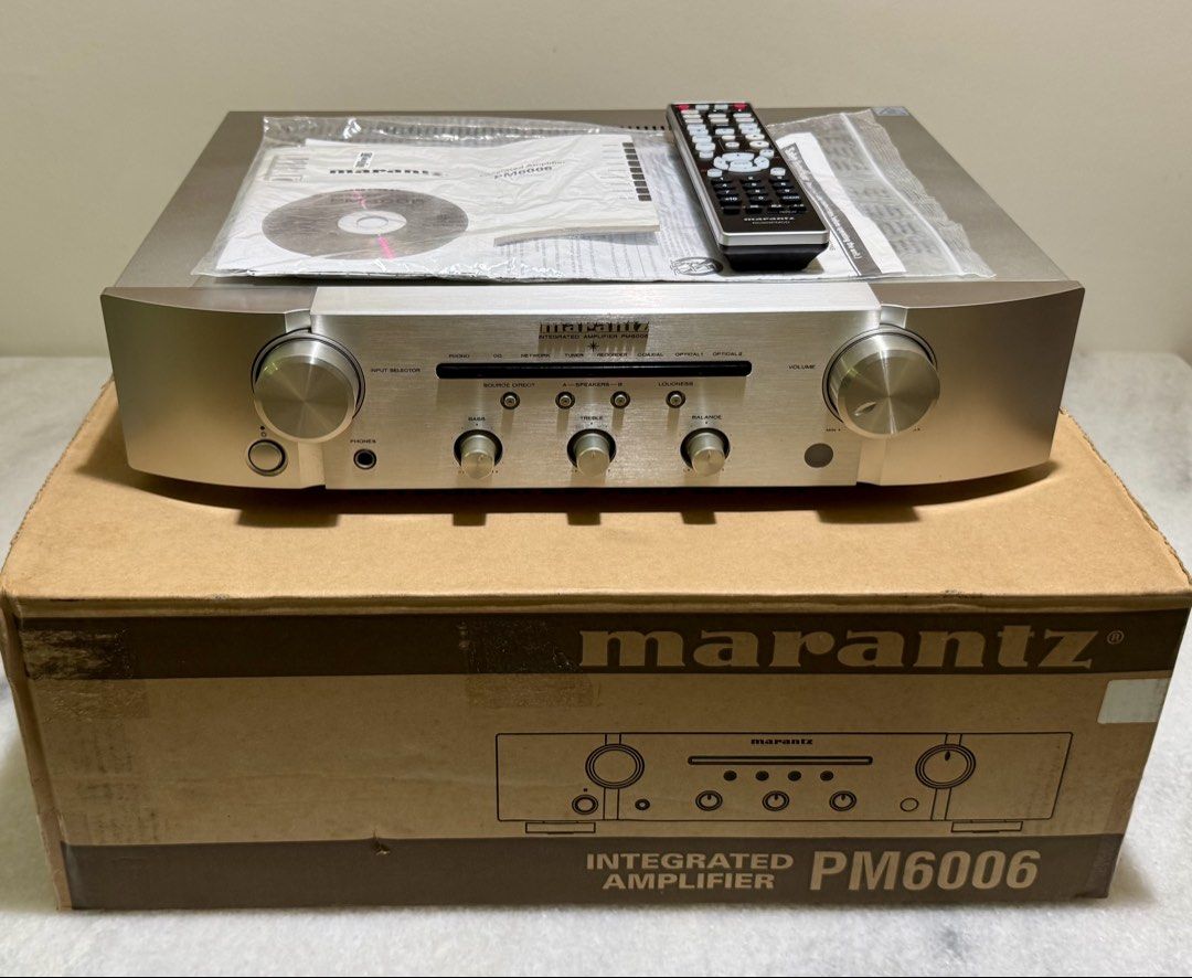 Marantz : PM 6006 HiFi Stereo Integrated Amplifier with full box and full original accessories (Silver) (Category: Soundbars, Speakers & Amplifiers) located in Singapore. Submitted by williamshz (Listing ID 1456909118, Image 1). Description: ▪️Local set and perfect working conditions (10/10) ▪️Full box full accessories as like day 1 purchase set ▪️Well known Award wining HiFi Stereo Amplifier with clear vocal and amazing sound stage ▪️Built-in DA