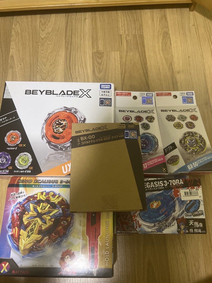 Beyblade X Lot: Xeno Xcalibur, Cobalt Drake, and More (Category: Action & Battle Toys) located in Singapore. Submitted by spectation (Listing ID 1457003346, Image 1). Description: Great for beginners Cobalt drake clear CX-17 RB(04) BX-50 RB (04) Take all for $200.