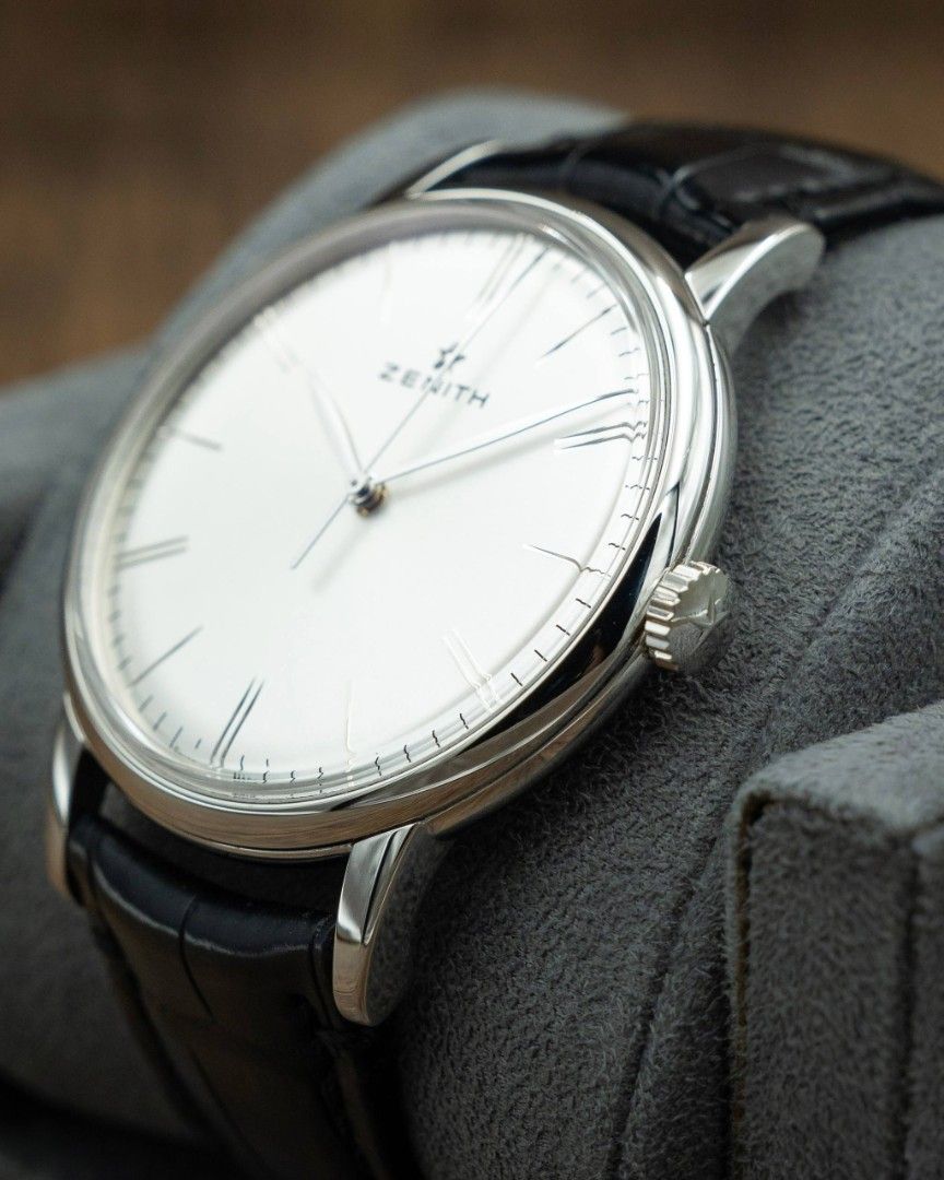 🔥VALUE🔥 Zenith Elite 6150 Stainless Steel 42mm Silver Dial 03.2770.6150 2017 Full Set Like New (Category: Watches) located in Singapore. Submitted by gdtimepieces (Listing ID 1456965914, Image 4). Description: ** Open to trades up/down! ** ** Shop Based ** Hi all, up for sales today is a Zenith Elite 6150, ref. 03.2770.6150. A superb and classy piece that checks all the boxes of a solid dress watch. Contemporarily sized at 42mm and boasting a 1