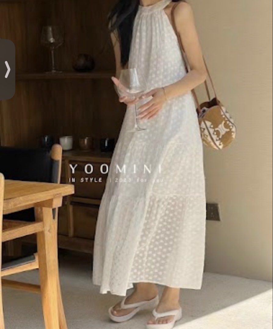 YOOMINI White Polka Dot Halter Neck Midi Dress (Category: Dresses) located in Singapore. Submitted by chrissy_28 (Listing ID 1456972621, Image 1). Description: - White midi dress - Halter neck design - Subtle polka dot pattern - Comfortable and breathable fabric - Versatile for casual outings or summer events - Easy to pair with sandals or heels My size for reference: Shoulder 40 Bust 85 Lower bust 77 Waist 70 Lower waist below belly button 80 Hi
