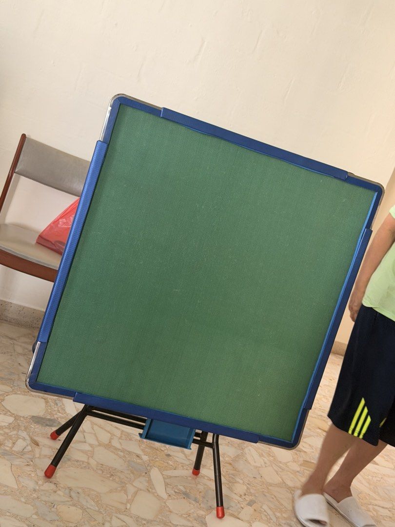 Foldable Mahjong Table (Category: Tables & Sets) located in Singapore. Submitted by kimberlin (Listing ID 1457226639, Image 2). Description: - Foldable mahjong table - Green playing surface with blue frame - Folds for easy storage - Ideal for game nights -.