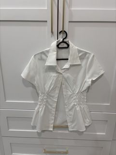 cinched white blouse