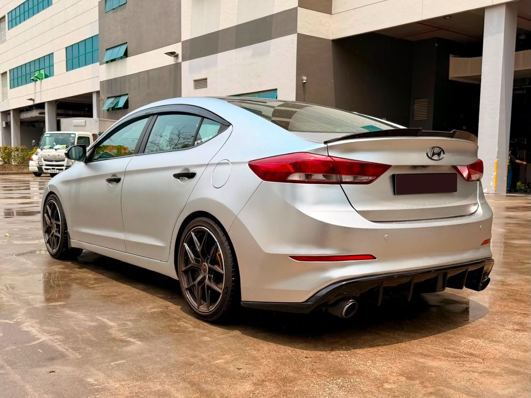 Hyundai Elantra 1.6A GLS (Category: Used Cars) located in Singapore. Submitted by terra.cars.sg (Listing ID 1457749711, Image 7). Description: Features: 1.6v DOHC 1.6L dual VVT engine, smooth 6 speed transmission, ABS, SRS airbags, traction control, smart keyless entry/start. Accessories: Factory media/BT/audio system. Reverse camera. Leather seats,15"sports rims, multi functions steering,auto headlamp, front fog, knockdown rear seat. Description