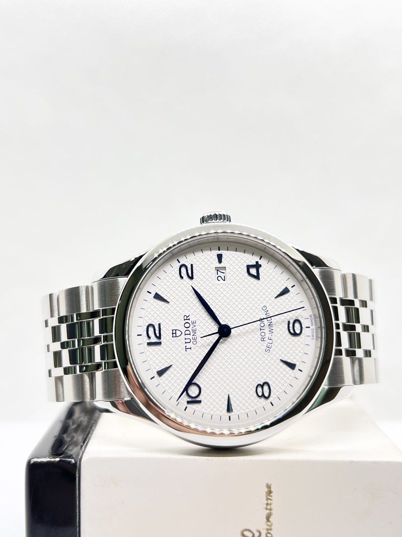 Brand New Tudor 1926 91550 White Dial Automatic Steel Casing Bracelet ( Aug 26 ) (Category: Watches) located in Singapore. Submitted by brightime (Listing ID 1458003952, Image 1). Description: Brand New Tudor 1926 91550 White Dial Automatic Steel Casing Bracelet ( Aug 26 ) ** Brand New ** Model : 91550 Also known as : 1926 Case size : 39mm Dial : White Dial With Blue Numerals Index Case metal : Polished Stainless Steel Clasp/ Buckle Type : Steel 