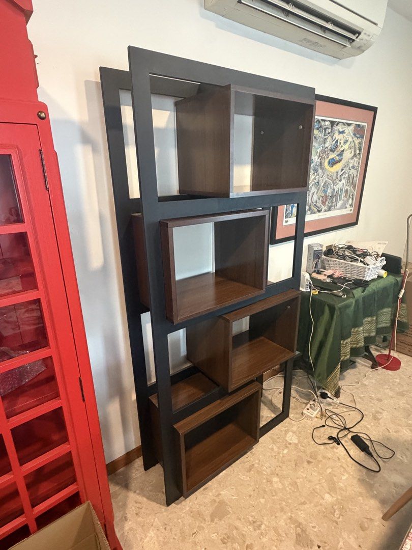 Mid century Modern Black metal and Walnut wood open Cube Bookshelf (Category: Shelves, Cabinets & Racks) located in Singapore. Submitted by vshern (Listing ID 1457961894, Image 1). Description: Pickup from duku road Excellent condition with no issues or breakage or warping Well maintained and cleaned Very sleek and elegant 35 x 90 x 185 cm Moving house sale Open to offers If its not reserved, its available Make an offer to reserve if so.