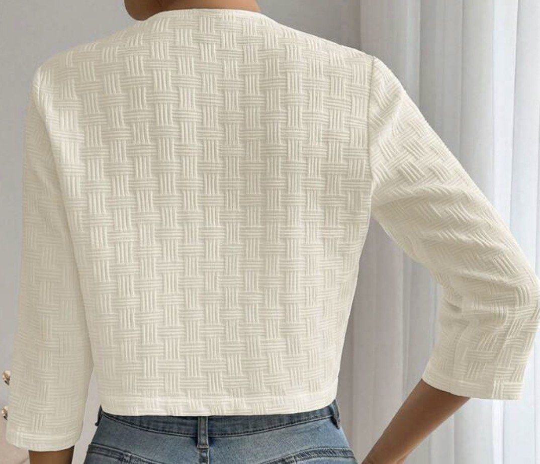 SHEIN Textured Cropped Jacket with Gold Buttons (Category: Coats, Jackets and Outerwear) located in Singapore. Submitted by snowy18486 (Listing ID 1457909655, Image 2). Description: - SHEIN cream textured cropped jacket - Size XS - Open front, no closure - Three-quarter sleeves with decorative gold buttons at cuffs - Ideal for layering over tops or dresses.