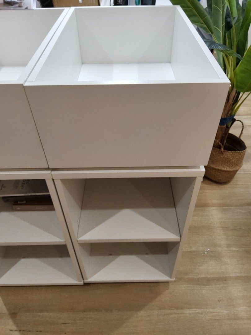 White cube bookshelf/cabinet (Category: Shelves, Cabinets & Racks) located in Singapore. Submitted by ktosg (Listing ID 1457989028, Image 1). Description: White cube bookshelf/cabinet Measurements: 110 x 45 x 70 4 Shelves available -------------------------- Chat to buy, kindly DO NOT make direct purchase with the 'BUY' button. Price is fixed and non-negotiable. Delivery is NOT provided and the buyer must bear all transportation costs. The item m