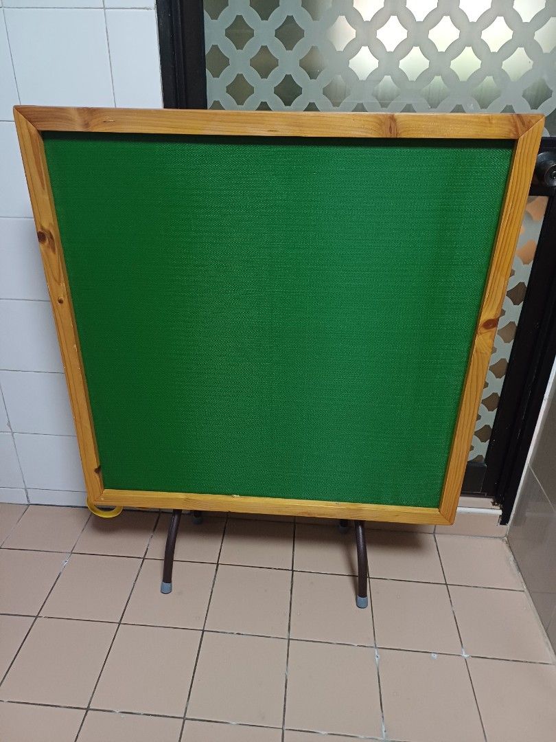 Foldable Mahjong Table with Green Surface (Category: Tables & Sets) located in Singapore. Submitted by joanne23 (Listing ID 1458144451, Image 2). Description: - Foldable Mahjong Table - Vibrant Green Playing Surface - Wooden Frame - Sturdy Metal Legs - Folds for Easy Storage - Ideal for Game Nights.
