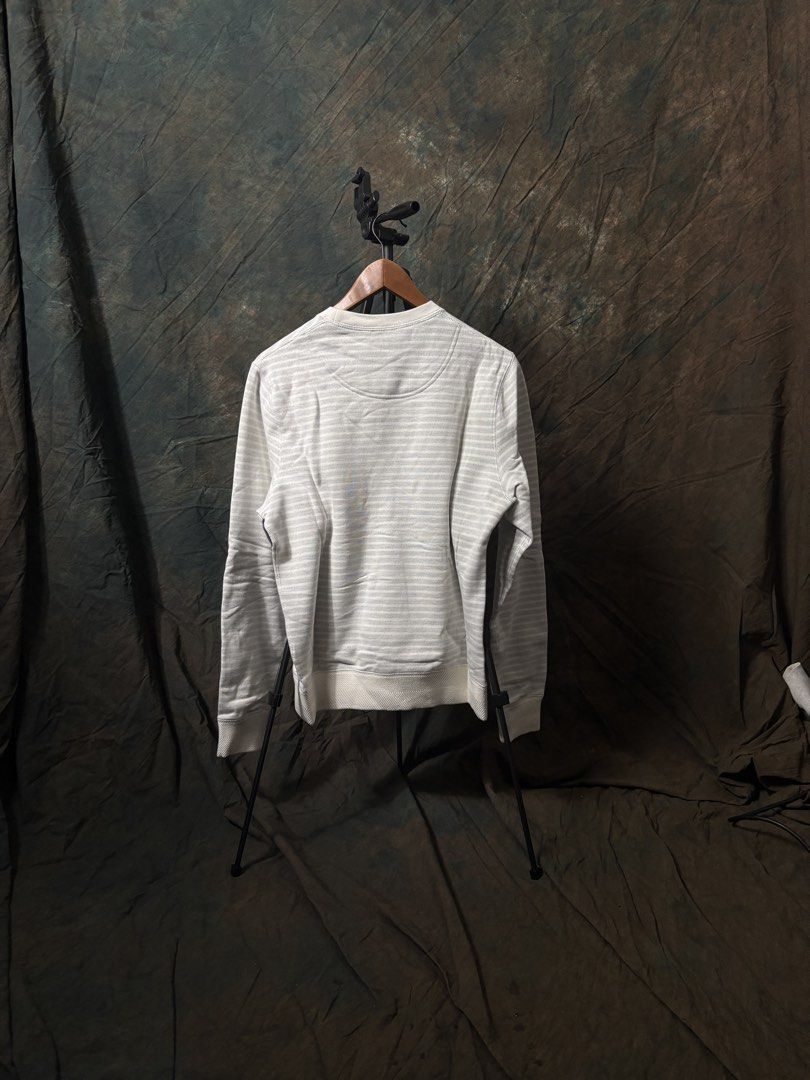 MENS KENZO PARIS Striped Sweatshirt (Category: Longsleeves) located in Singapore. Submitted by supsg (Listing ID 1458211095, Image 2). Description: - White and grey striped sweatshirt - Features 'Kenzo Paris' graphic on front - Long sleeves - Crew neck - Comfortable fit - Ideal for casual wear.
