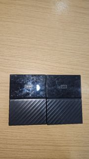 Clearance  sale - 2 x WD My Passport  1TB External Hard Drives - 2 for $50 - no cable wires provided- In good working condition no Issues