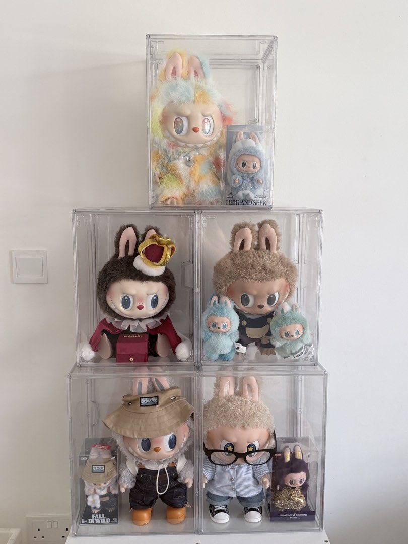 Pop Mart Molly Labubu Dimoo Art Toys Figures (Category: Designer & Blind Box Toys) located in Singapore. Submitted by chenchenQYY (Listing ID 1458383020, Image 1). Description: - Collection of art toys available - still have original packaging - displayed in protective acrylic cases - Feel free to message for inquiries about specific toys Self collect at Hougang St 12 .