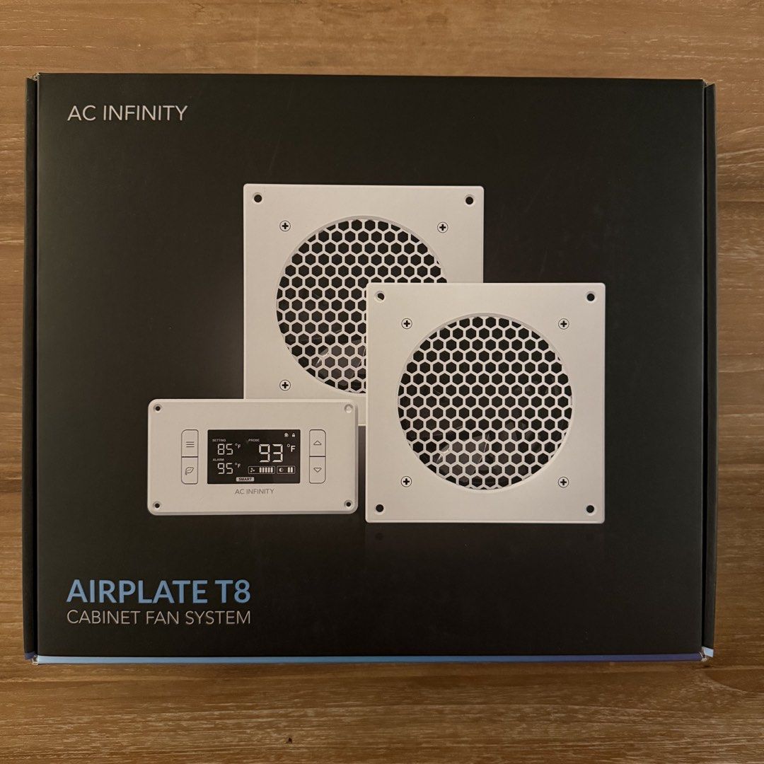 AC Infinity Airplate T8 cabinet cooling fan (Category: Networking) located in Singapore. Submitted by wlshr (Listing ID 1458537243, Image 1). Description: Brand new and unused. Still sealed in the box. This is a quiet cooling fan panel for AV cabinets, home theatre racks, and media consoles. It has two 80mm fans and thermal control with programmable temperature and speed. The box includes the controller, thermal sensor, power adapter with SG plug