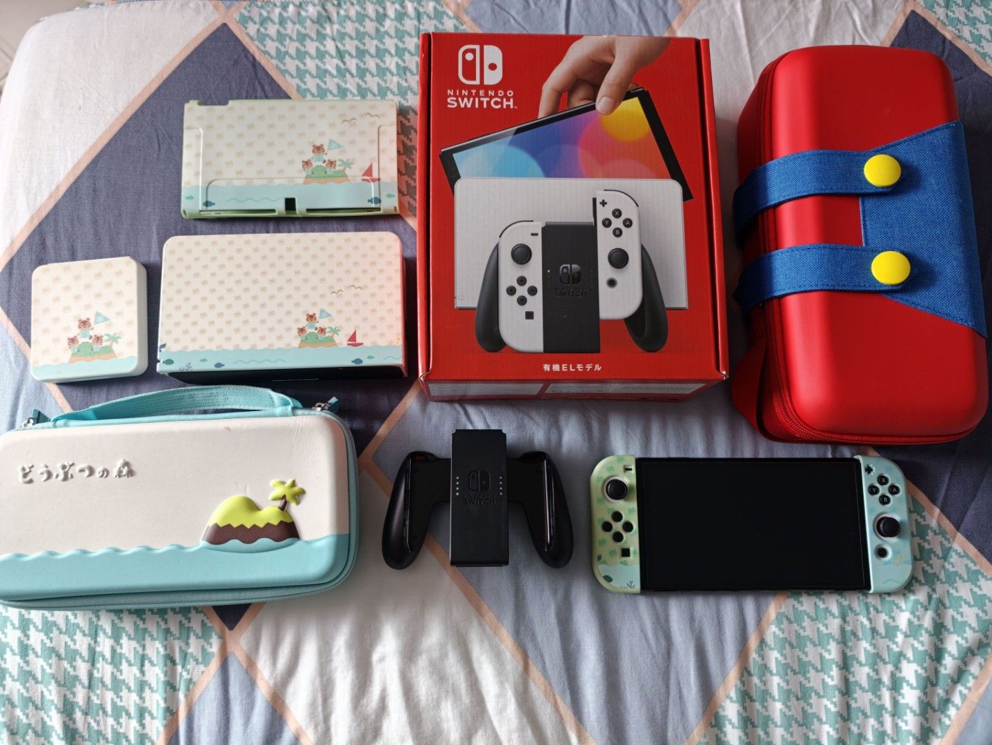 Nintendo Switch OLED White with Accessories (Category: Nintendo) located in Singapore. Submitted by cruor42 (Listing ID 1458575556, Image 1). Description: Nintendo Switch OLED Model (White) Includes all original accessories as well as additional third party accessories as pictured -power and HDMI cable included Cute Animal Crossing themed case, dock cover, joycons and console cover and game cartridge storage case Includes Mario themed big carryin