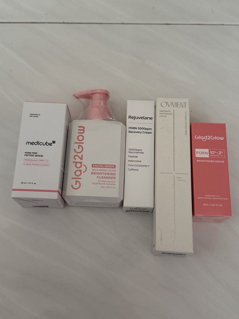 [WTS] BRAND NEW Korean Skincare - Medicube, Glad2Glow, Rejuvelane, Ovment Skincare Bundle (Category: Face Care) located in Singapore. Submitted by caramxlfrappe (Listing ID 1458551084, Image 1). Description: - Korean Skincare for improved skin tone and hydration. - Includes: - Medicube PDRN Pink Peptide Serum - Glad2Glow Facial Wash - Glad2Glow Brightening Serum - Rejuvelane PDRN Recovery Cream - Ovment Brightening Cream - All products are PDRN a