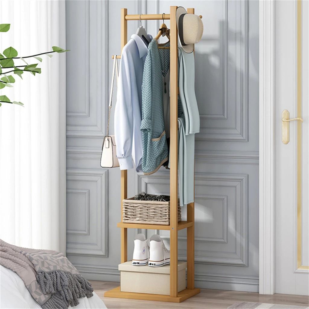 Bamboo Coat Rack Stand | Bedroom Wardrobe Hanger Organizer | Wood Drying Clothes Organizer | Hanging Pole Stand | Multi Tier Storage Shelf | Free Standing Garment Rack | Hall Tree Entryway Organizer (Category: Clothes Drying Rack) located in Singapore. Submitted by casahomesg (Listing ID 1458786345, Image 2). Description: Organize your living space efficiently with this versatile Bamboo Coat Rack Stand, designed to serve as an all-in-one bedroom 