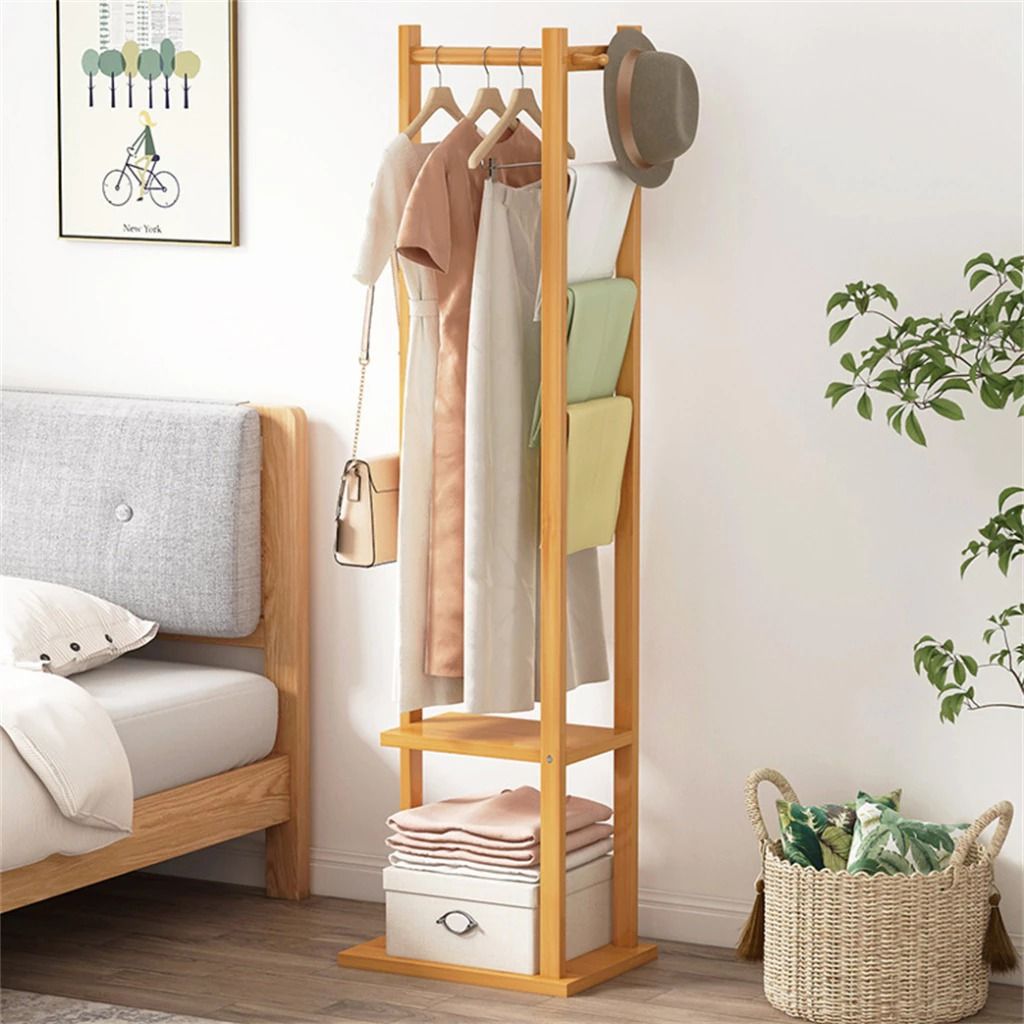 Bamboo Coat Rack Stand | Bedroom Wardrobe Hanger Organizer | Wood Drying Clothes Organizer | Hanging Pole Stand | Multi Tier Storage Shelf | Free Standing Garment Rack | Hall Tree Entryway Organizer (Category: Clothes Drying Rack) located in Singapore. Submitted by casahomesg (Listing ID 1458786345, Image 1). Description: Organize your living space efficiently with this versatile Bamboo Coat Rack Stand, designed to serve as an all-in-one bedroom 