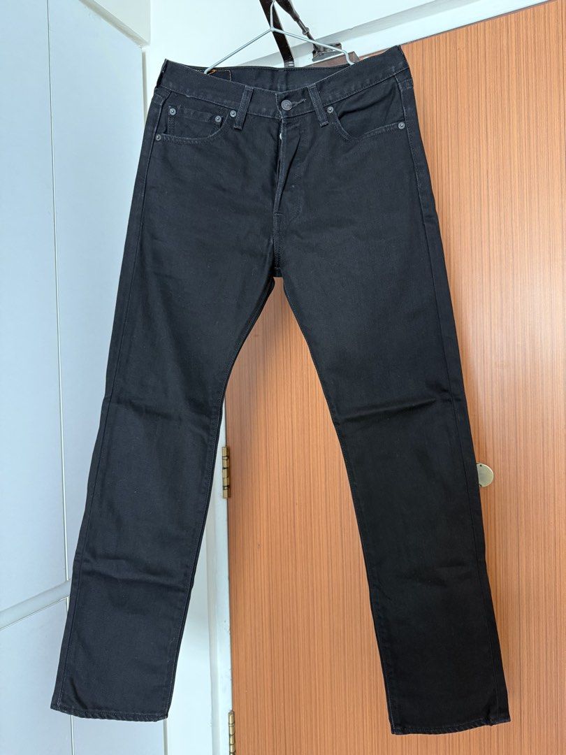 Levi's 501 Black Jeans W30 L32 (Category: Jeans) located in Singapore. Submitted by lukeman101 (Listing ID 1458746080, Image 4). Description: - Classic black Levi's 501 jeans - Size: W30 L32 - Button fly closure - Straight leg fit - Made in Mexico - Versatile staple piece for any wardrobe.