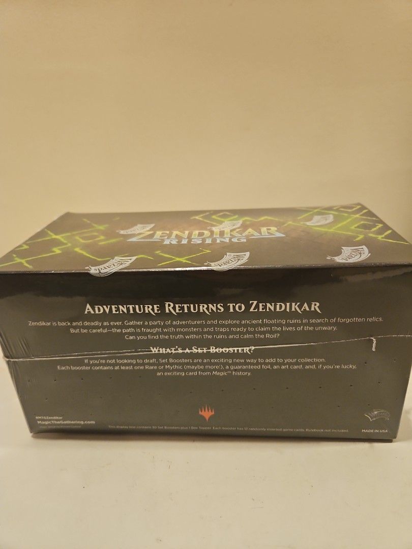Magic The Gathering Zendikar Rising Set Booster Box (Category: Card Boxes & Cases) located in Singapore. Submitted by philibertg (Listing ID 1453770078, Image 2). Description: - Zendikar Rising Set Booster Box - Features the return of Adventure mechanics - Each pack guarantees at least one Rare or Mythic Rare card - Includes a guaranteed 'Forgotten Realms' card - Ideal for collectors looking to expand their collection - Made in USA.