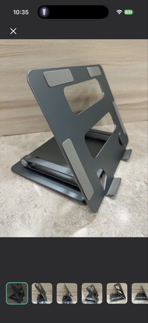 Adjustable Aluminum Laptop Stand - Grey (Category: Mounts & Holders) located in Singapore. Submitted by polarbear6043 (Listing ID 1454048047, Image 1). Description: Like new. Collect at AMK Ave 5 Blk 602 / Lentor MRT / YCK MRT Free delivery for selected locations. Dimensions: 26.5cm(Length) × 22cm (Breadth) Price Negotiable..
