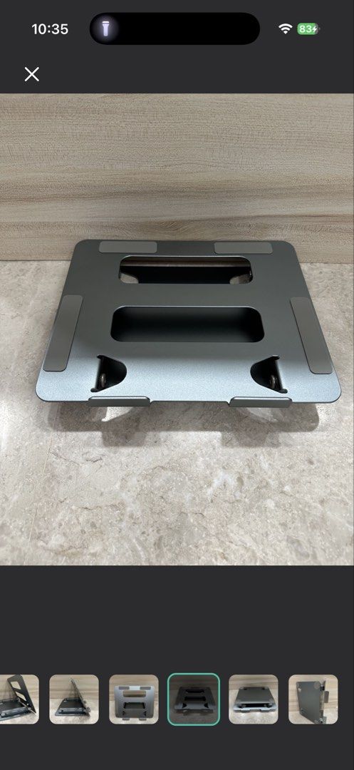 Adjustable Aluminum Laptop Stand - Grey (Category: Mounts & Holders) located in Singapore. Submitted by polarbear6043 (Listing ID 1454048047, Image 8). Description: Like new. Collect at AMK Ave 5 Blk 602 / Lentor MRT / YCK MRT Free delivery for selected locations. Dimensions: 26.5cm(Length) × 22cm (Breadth) Price Negotiable..