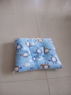 Blue baby pillow with helicopter print